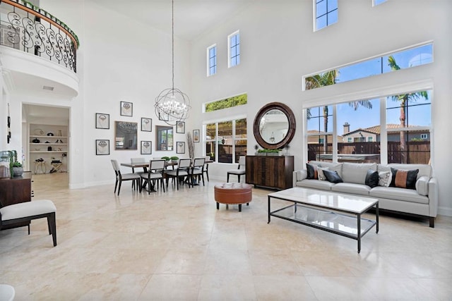 2814 Rambling Vista Rd, Chula Vista, CA 91915 - living area with a high ceiling, a chandelier, plenty of natural light, and ornamental molding
