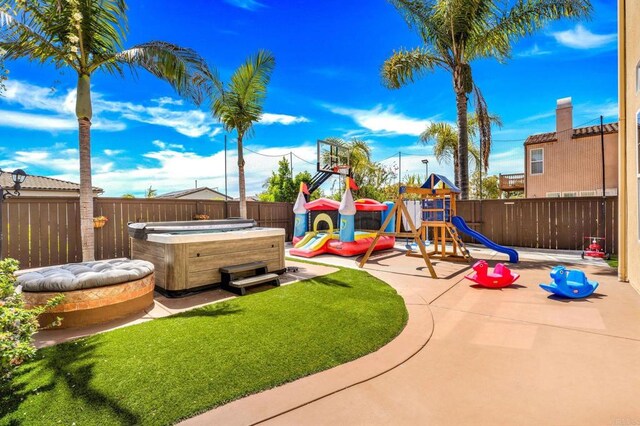 2814 Rambling Vista Rd, Chula Vista, CA 91915 - view of jungle gym featuring a hot tub and a fenced backyard
