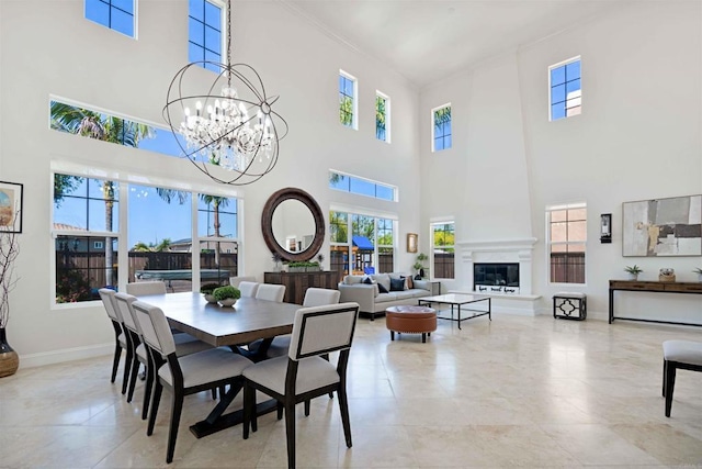 2814 Rambling Vista Rd, Chula Vista, CA 91915 - dining area featuring healthy amount of natural light, a high ceiling, a chandelier, and light tile patterned flooring