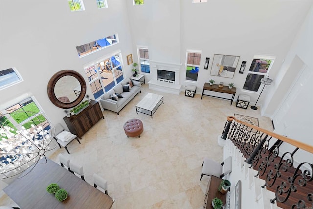2814 Rambling Vista Rd, Chula Vista, CA 91915 - tiled living area with a high ceiling and a glass covered fireplace