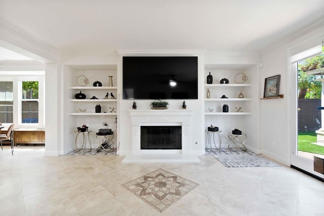 2814 Rambling Vista Rd, Chula Vista, CA 91915 - living room with built in shelves, ornamental molding, and a glass covered fireplace