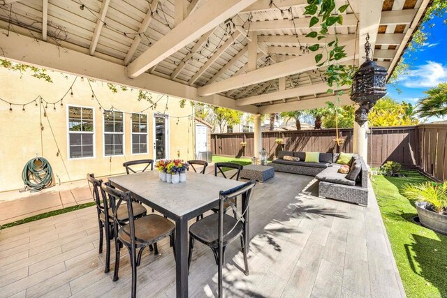 2814 Rambling Vista Rd, Chula Vista, CA 91915 - fenced backyard featuring a patio, outdoor lounge area, and outdoor dining space