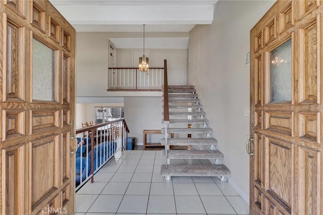 2146 N Brower St, Simi Valley, CA 93065 - stairs featuring tile patterned flooring, beam ceiling, and a chandelier