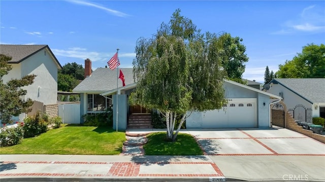 2146 N Brower St, Simi Valley, CA 93065 - view of front of home featuring a garage, concrete driveway, and a gate
