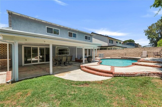 2146 N Brower St, Simi Valley, CA 93065 - rear view of property with a fenced backyard, stucco siding, and a patio area