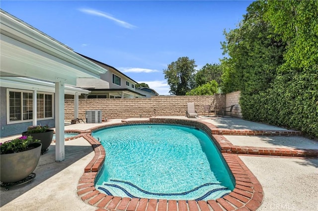 2146 N Brower St, Simi Valley, CA 93065 - view of swimming pool featuring a patio area, a fenced backyard, and a pool with connected hot tub
