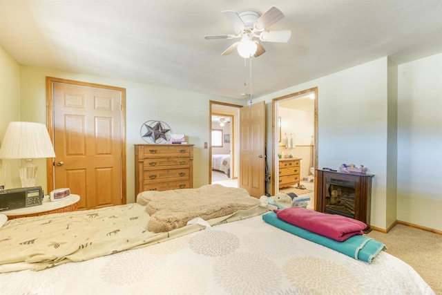 2015 Temple Trl, Jamul, CA 91935 - bedroom with carpet flooring, connected bathroom, and a ceiling fan