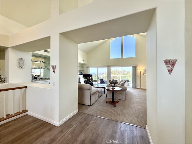 21 Centaurus Unit 3, Irvine, CA 92603 - living area with high vaulted ceiling and wood finished floors