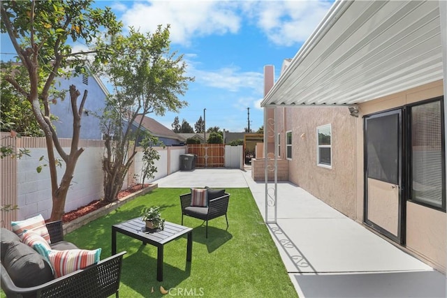 17824 Holmes Ave, Cerritos, CA 90703 - fenced backyard with a patio area and an outdoor living space