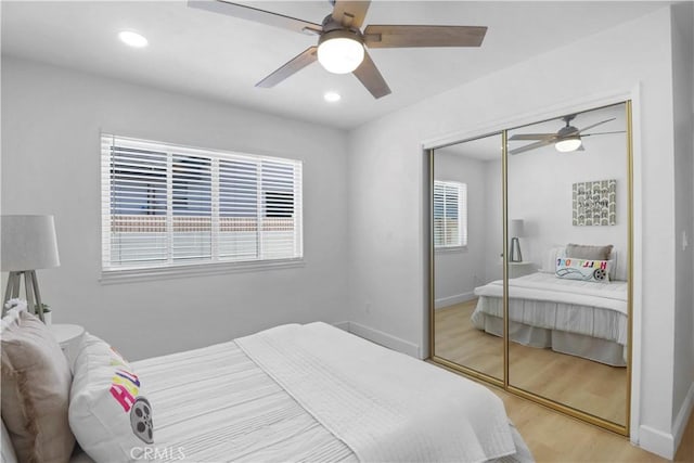 17824 Holmes Ave, Cerritos, CA 90703 - bedroom featuring light wood-style floors, a closet, a ceiling fan, and recessed lighting
