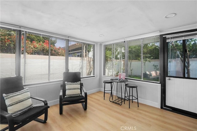 17824 Holmes Ave, Cerritos, CA 90703 - sunroom featuring wood finished floors and baseboards