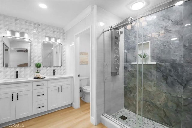17824 Holmes Ave, Cerritos, CA 90703 - full bath featuring double vanity, wood finished floors, a stall shower, tasteful backsplash, and recessed lighting