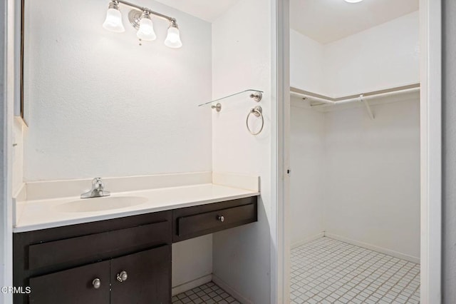 1310 Anza Ct, Oxnard, CA 93035 - bathroom with vanity and a walk in closet