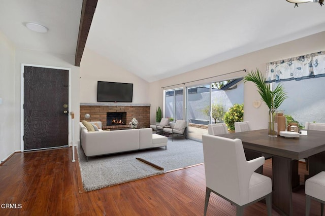 1310 Anza Ct, Oxnard, CA 93035 - living room featuring wood finished floors and a brick fireplace