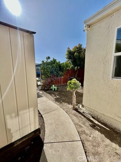 430 W 19th St, San Pedro, CA 90731 - view of side of home featuring stucco siding