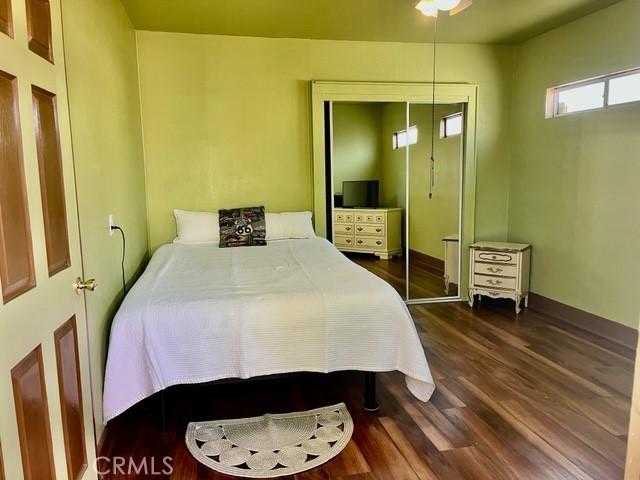 430 W 19th St, San Pedro, CA 90731 - bedroom with wood finished floors and a closet