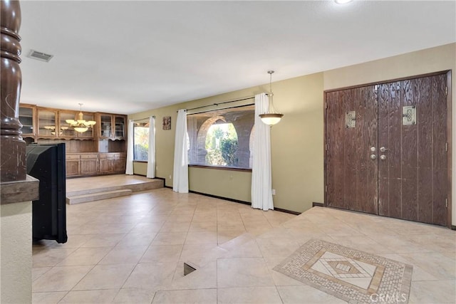19996 Eyota Rd, Apple Valley, CA 92308 - foyer entrance with a chandelier and tile patterned floors