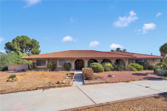 19996 Eyota Rd, Apple Valley, CA 92308 - mediterranean / spanish-style home featuring stucco siding and a tiled roof