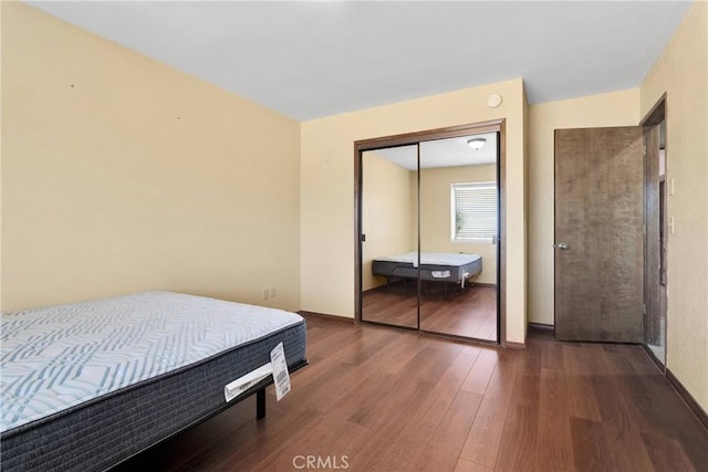 19996 Eyota Rd, Apple Valley, CA 92308 - bedroom with wood finished floors and a closet