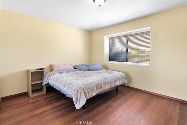 19996 Eyota Rd, Apple Valley, CA 92308 - bedroom with wood finished floors and baseboards