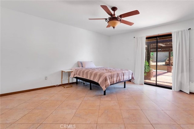 19996 Eyota Rd, Apple Valley, CA 92308 - bedroom featuring access to exterior, light tile patterned floors, and a ceiling fan