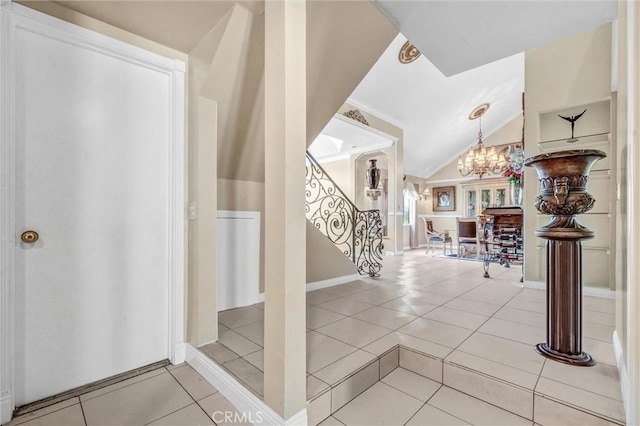 3486 Santa Clara Cir, Costa Mesa, CA 92626 - foyer featuring light tile patterned flooring, stairway, a chandelier, and lofted ceiling
