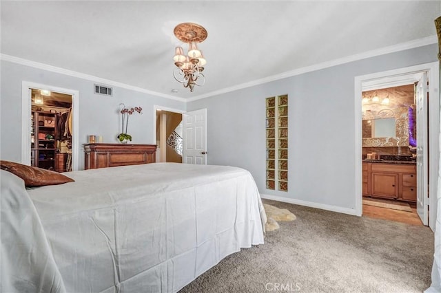 3486 Santa Clara Cir, Costa Mesa, CA 92626 - bedroom featuring crown molding, light colored carpet, a chandelier, a walk in closet, and ensuite bath