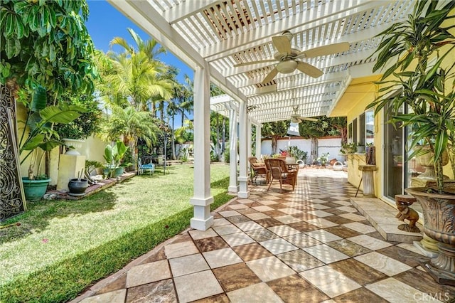 3486 Santa Clara Cir, Costa Mesa, CA 92626 - fenced backyard with a ceiling fan, a pergola, outdoor dining area, and a patio