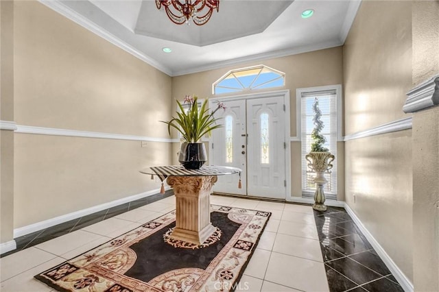 3486 Santa Clara Cir, Costa Mesa, CA 92626 - tiled entryway with crown molding, a chandelier, and inlaid floor details