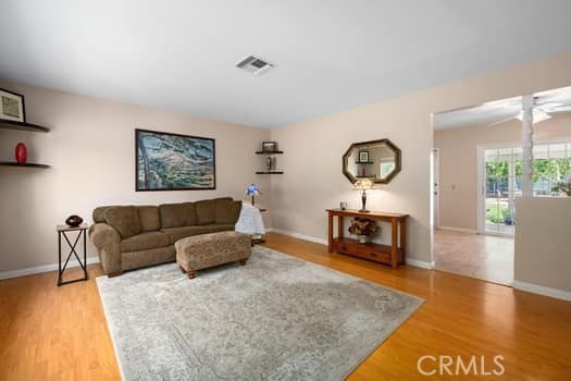 2968 Casitas Ave, Altadena, CA 91001 - living room with light wood-type flooring and ceiling fan