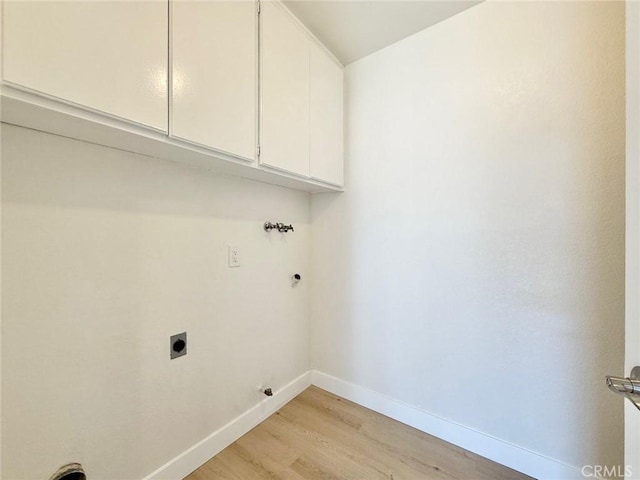 1850 Pritchard Way, Hacienda Heights, CA 91745 - laundry room with electric dryer hookup, cabinet space, light wood-style floors, and hookup for a washing machine
