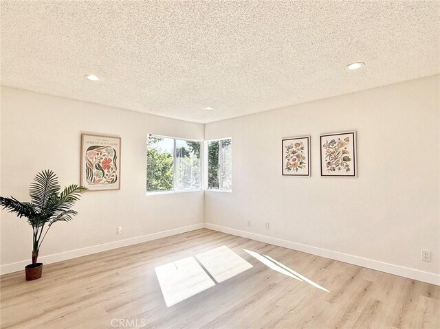 1850 Pritchard Way, Hacienda Heights, CA 91745 - unfurnished room with recessed lighting, a textured ceiling, and light wood finished floors
