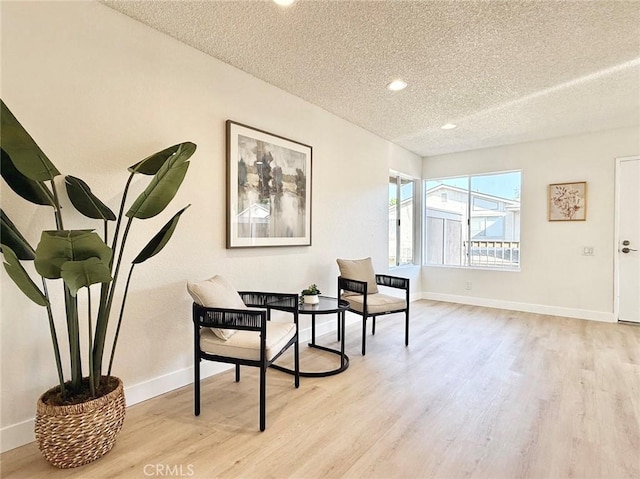 1850 Pritchard Way, Hacienda Heights, CA 91745 - living area with a textured ceiling, light wood-style floors, and recessed lighting