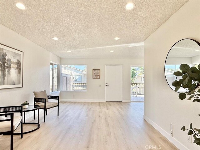 1850 Pritchard Way, Hacienda Heights, CA 91745 - foyer entrance with a textured ceiling, light wood-type flooring, and recessed lighting