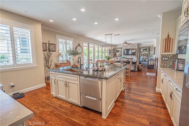 22348 Driftwood Ct, Saugus, CA 91350 - kitchen featuring stainless steel dishwasher, a ceiling fan, recessed lighting, dark stone countertops, and dark wood-style flooring