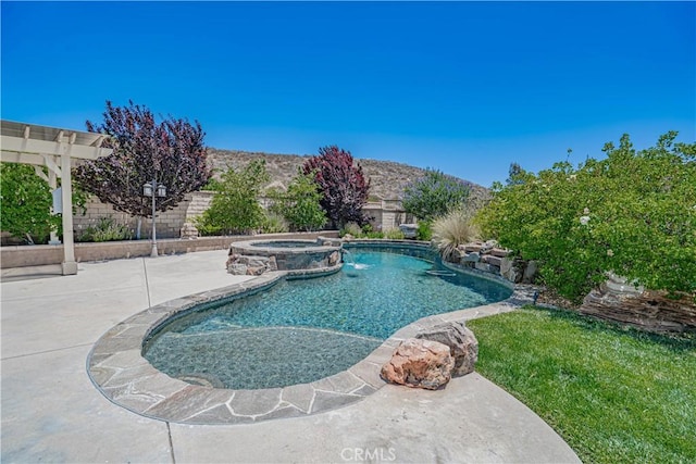 22348 Driftwood Ct, Saugus, CA 91350 - view of swimming pool featuring a patio area, a pool with connected hot tub, and a fenced backyard