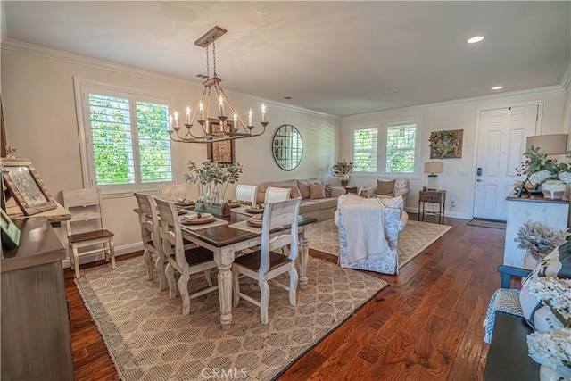 22348 Driftwood Ct, Saugus, CA 91350 - dining space featuring ornamental molding, a chandelier, dark wood finished floors, and recessed lighting