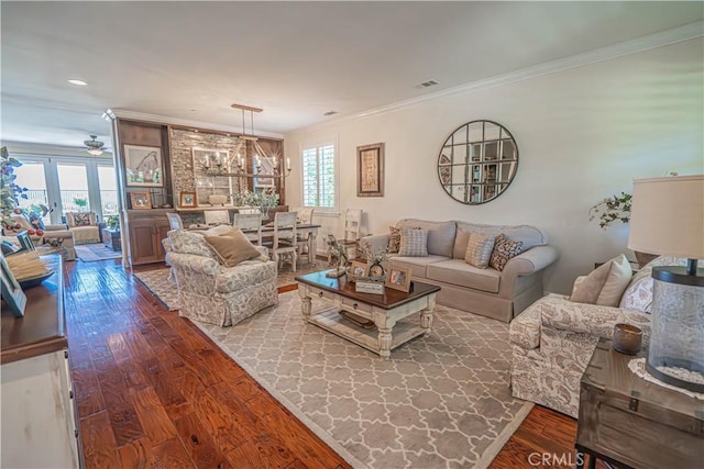 22348 Driftwood Ct, Saugus, CA 91350 - living room with wood finished floors, ornamental molding, and ceiling fan