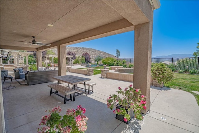 22348 Driftwood Ct, Saugus, CA 91350 - view of patio with a mountain view, an outdoor living space, and a ceiling fan