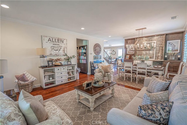 22348 Driftwood Ct, Saugus, CA 91350 - living room featuring ornamental molding, a chandelier, wood finished floors, and recessed lighting