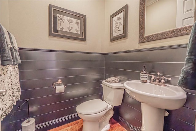 22348 Driftwood Ct, Saugus, CA 91350 - bathroom with a wainscoted wall and wood finished floors