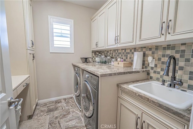 22348 Driftwood Ct, Saugus, CA 91350 - washroom with cabinet space and independent washer and dryer