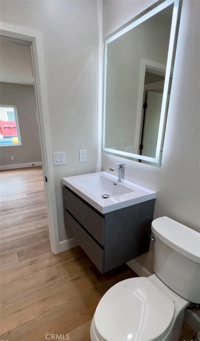 3520 Grand Ave, Huntington Park, CA 90255 - bathroom with vanity and wood finished floors