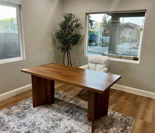 3520 Grand Ave, Huntington Park, CA 90255 - dining room featuring baseboards and wood finished floors