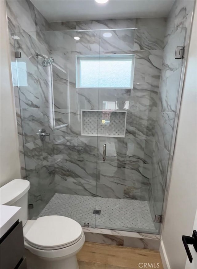 3520 Grand Ave, Huntington Park, CA 90255 - bathroom featuring vanity, a marble finish shower, and wood finished floors