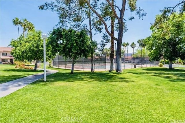 6105 Montecito Dr Unit 5, Palm Springs, CA 92264 - view of community with a tennis court