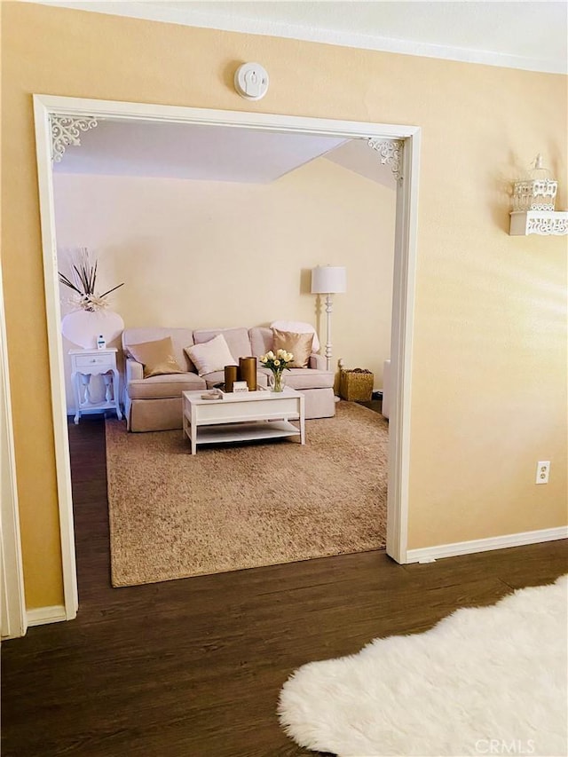 6105 Montecito Dr Unit 5, Palm Springs, CA 92264 - living room featuring dark wood-type flooring and baseboards