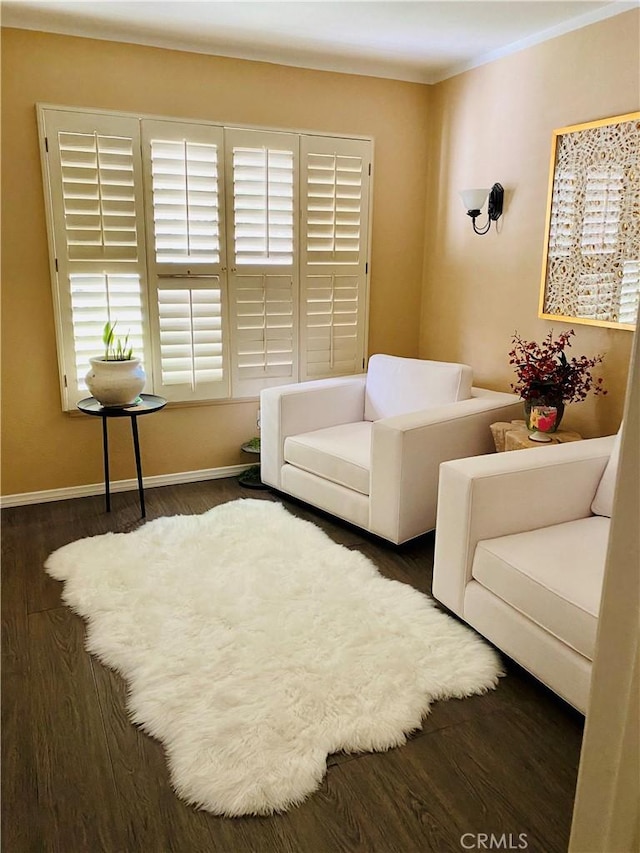 6105 Montecito Dr Unit 5, Palm Springs, CA 92264 - living room with wood finished floors, ornamental molding, and healthy amount of natural light