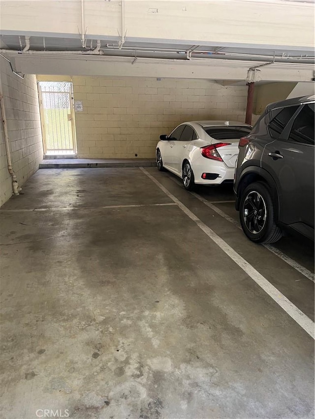 6155 Reseda Blvd Unit 9, Tarzana, CA 91335 - parking garage featuring concrete block wall