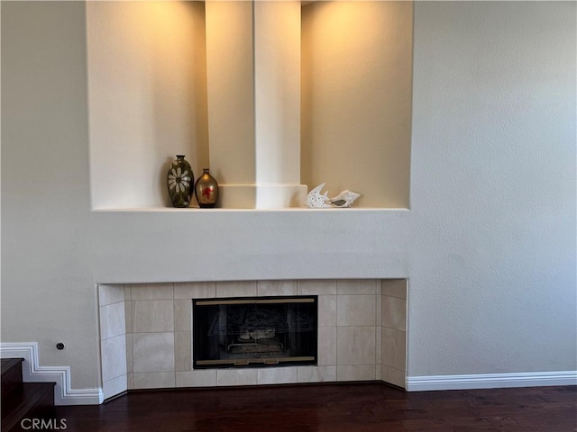 5 Arese Aisle, Irvine, CA 92606 - detailed view of wood finished floors and a fireplace